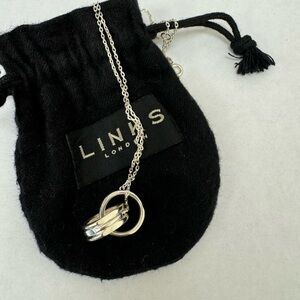 Links Of Lonfon silver chain.